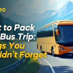 A yellow luxury bus driving along a winding road with scenic mountains and lush greenery in the background. The text overlay reads 'What to Pack for a Bus Trip: Things You Shouldn’t Forget,' along with the Tummoc logo in the top left corner